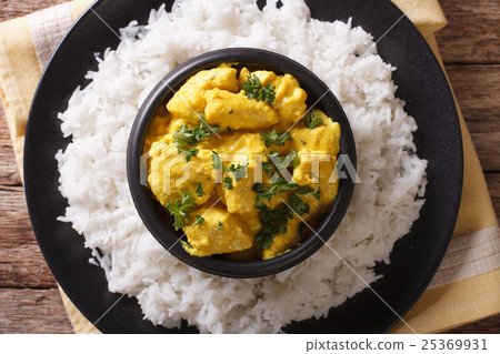 Chicken Korma on a mildly spiced creamy sauce 25369931