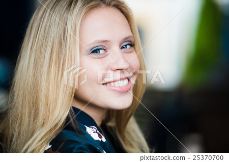Woman smiling with perfect smile white teeth in a Woman smiling with perfect smile white teeth in a 25370700