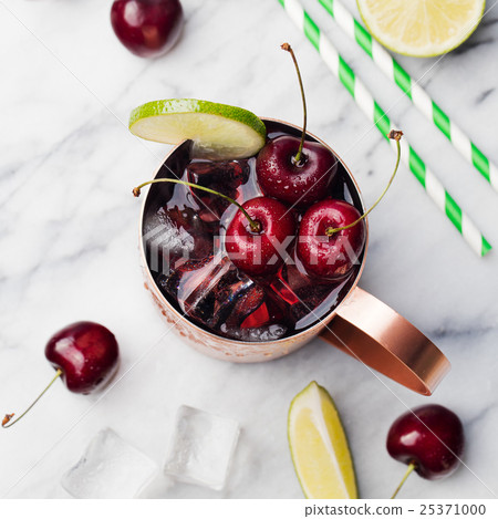 Cold cherry Moscow Mules cocktail with vodka, lime 25371000