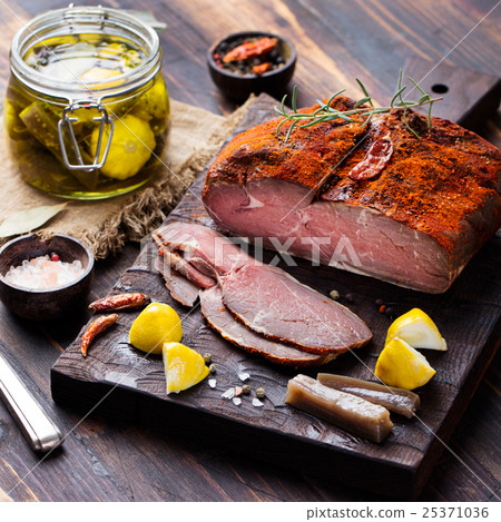 Beef pastrami sliced, roasted beef, slow cooking. 25371036