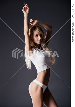 beautiful female sporty young woman in white beautiful female sporty young woman in white 25371152
