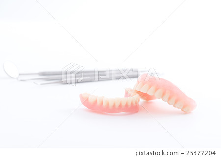 Set of denture and dental mirror, smile jaws teeth Set of denture and dental mirror, smile jaws teeth 25377204