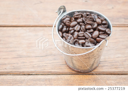 Roasted coffee beans in bucket Roasted coffee beans in bucket 25377219