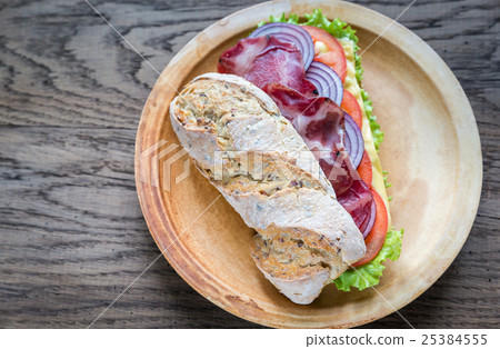 Sandwich with ham, cheese and fresh vegetables 25384555