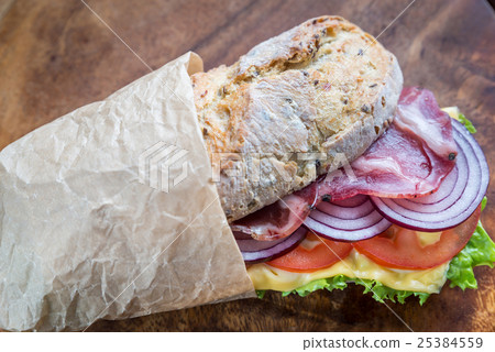 Sandwich with ham, cheese and fresh vegetables 25384559