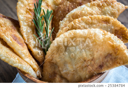 Stack of meat patties in the bowl Stack of meat patties in the bowl 25384784