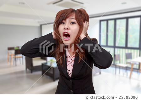Stressed businesswoman shocked or screaming Stressed businesswoman shocked or screaming 25385090