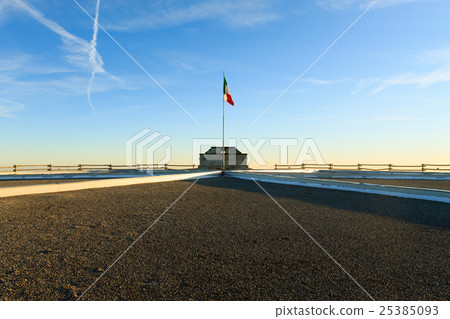 Italian flag on blue sky Italian flag on blue sky 25385093