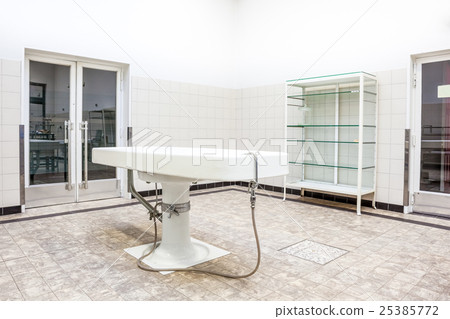 Autopsy tables in morgue 25385772
