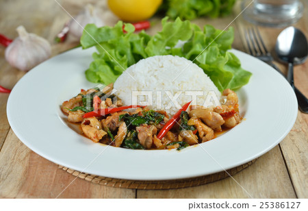 stir fried chicken with holy basil and hot chilli stir fried chicken with holy basil and hot chilli 25386127