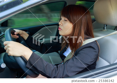 sleepy, tired, close eyes young woman driving car sleepy, tired, close eyes young woman driving car 25386142