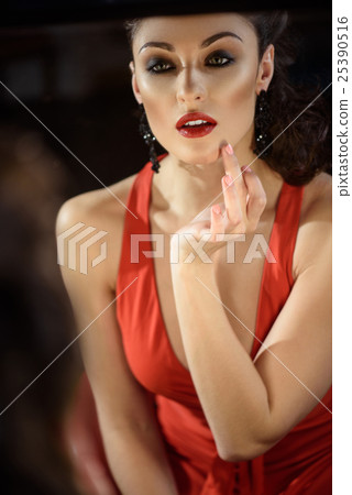 Elegant young woman with beautiful make-up 25390516