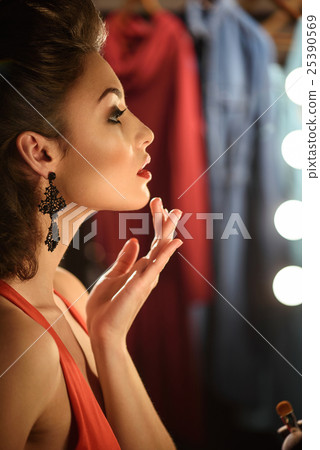 Beautiful female model with wonderful make-up Beautiful female model with wonderful make-up 25390569