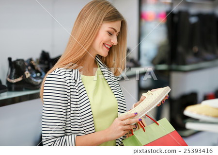 Happy woman shopping Happy woman shopping 25393416
