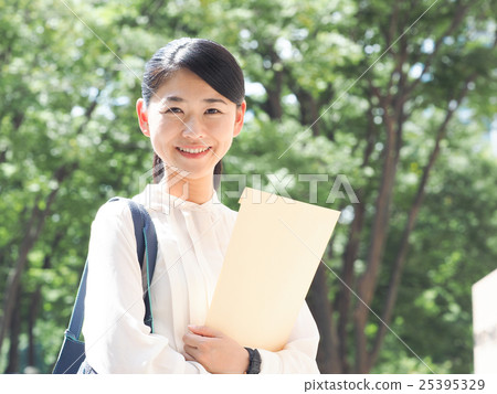 Business woman with envelope 25395329