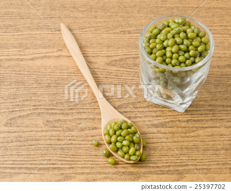 Mung Beans in A Spoon and Glass Cup 25397702
