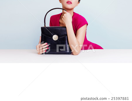 Black Leather Bag and Women Shopping Image Copy Space on Wall and Table 25397881
