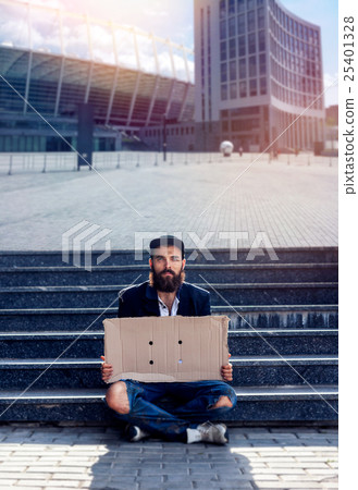 Vagrant with cardboard 25401328