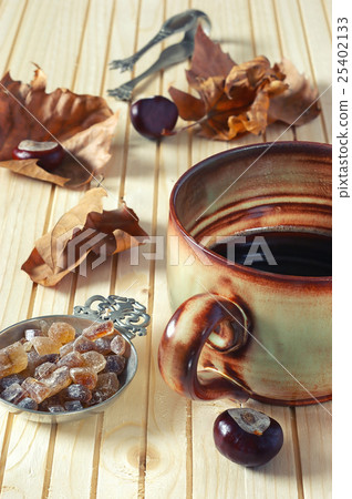 Cup of coffee and autumn leaves Cup of coffee and autumn leaves 25402133