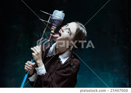 Portrait of a young girl in school uniform as a Portrait of a young girl in school uniform as a 25407008