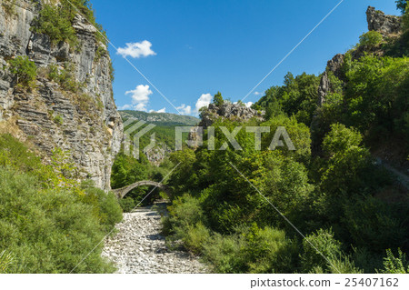 arch bridge at the entrance to Kipoi 25407162