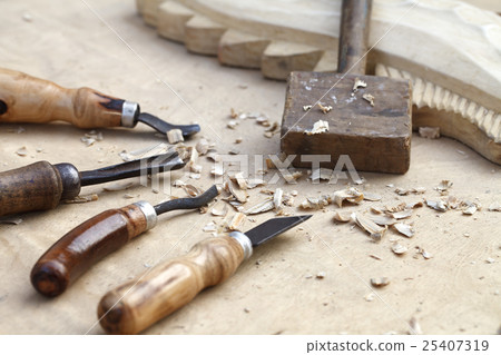 wood carvings, tools and processes work closeup 25407319