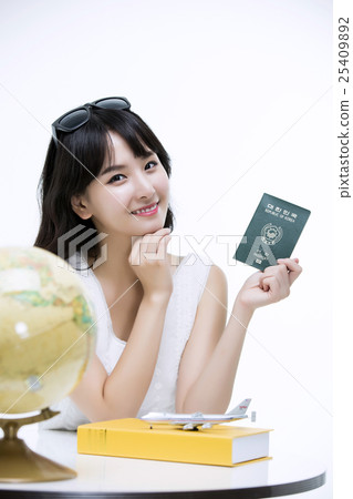 A young woman excited for vacation A young woman excited for vacation 25409892
