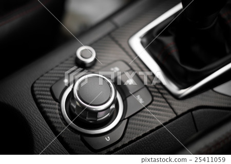 Detail of Multi function buttons in modern car. 25411059