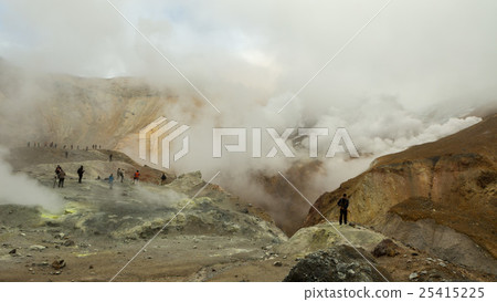 Climbing to active volcano Mutnovsky on Kamchatka. 25415225