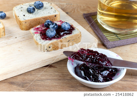 Vegetarian black sesame bread top blueberry jam 25418862