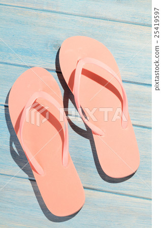 flip flops on table 25419597