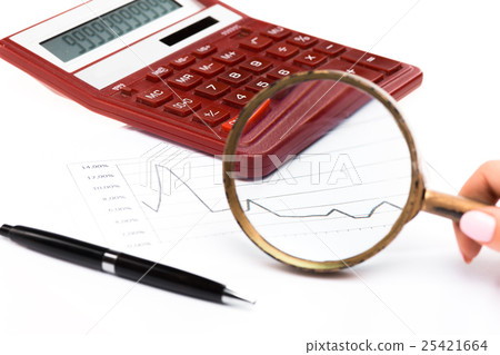 Magnifying glass with chart on paper 25421664