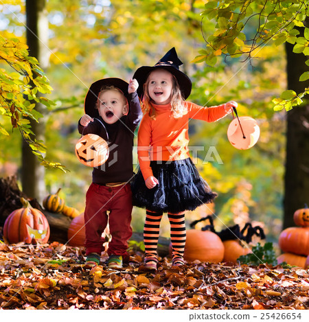 Kids with pumpkins on Halloween 25426654