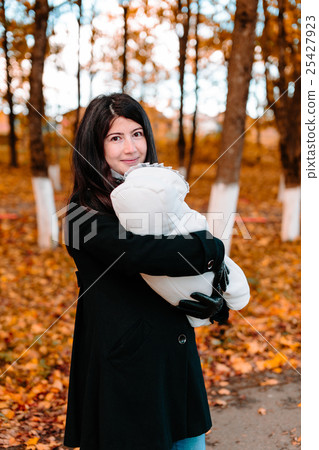 Young mother with her little baby on hand in Young mother with her little baby on hand in 25427923