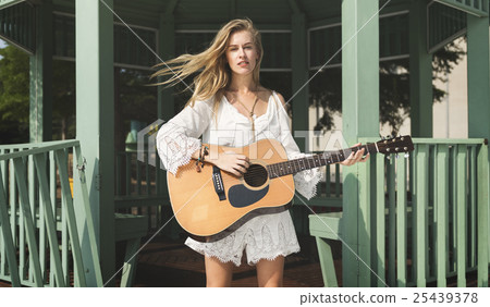 Guitar Girl Relaxation Casual Instrument Leisure Concept Guitar Girl Relaxation Casual Instrument Leisure Concept 25439378