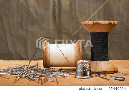 two spools of thread 25449034
