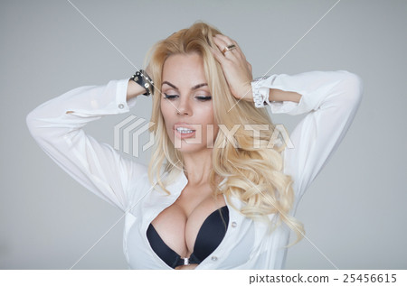 Sexy blond woman with big boobs Sexy blond woman with big boobs 25456615