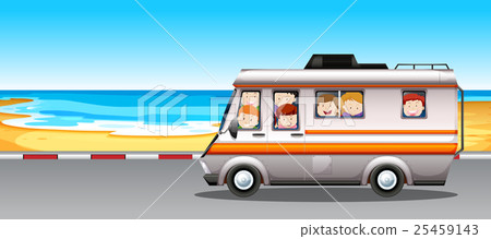 Children riding in camper van to the beach 25459143