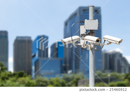 CCTV pillar with the building background CCTV pillar with the building background 25460912