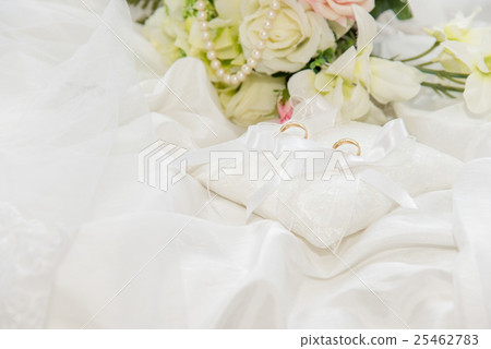 Ring pillow and wedding ring 25462783