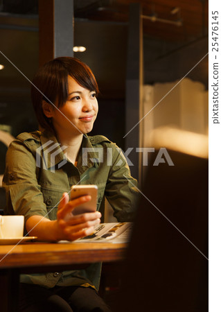 Cafe female young woman smart phone customer night lifestyle Cafe female young woman smart phone customer night lifestyle 25476145