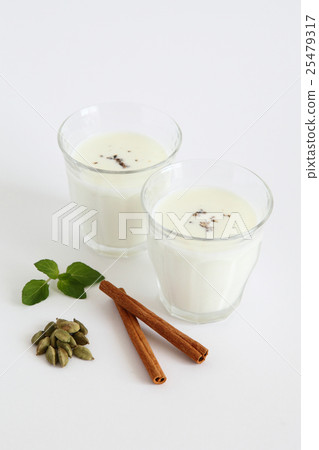 Lassi and spice (Indian yogurt drink) Lassi and spice (Indian yogurt drink) 25479317