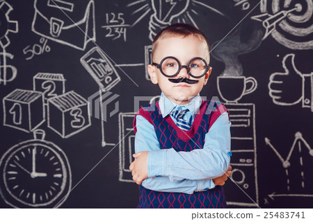 Little boy as businessman or teacher with mustache Little boy as businessman or teacher with mustache 25483741