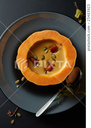Cream of pumpkin soup with seeds 25483923