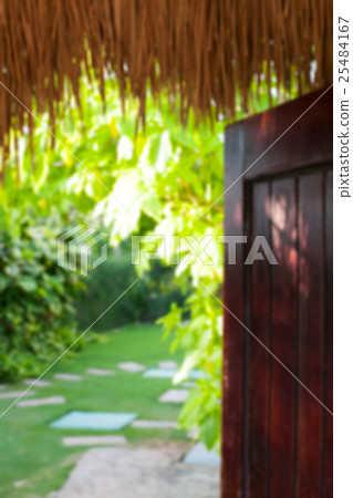 Blurred tropical summer bungalow background Blurred tropical summer bungalow background 25484167