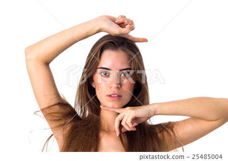 Woman holding hands around her face  Woman holding hands around her face  25485004