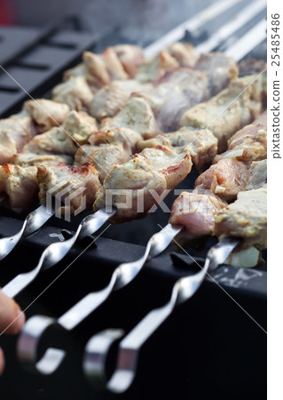 Skewered marinated raw pork 25485486