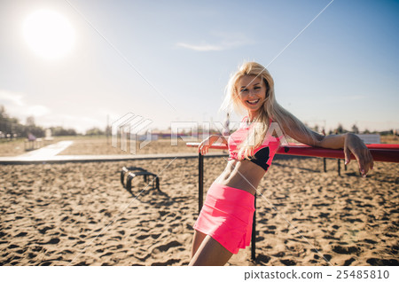 Portrait of a fit young woman resting after 25485810