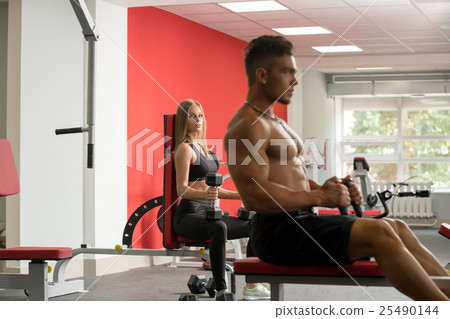 Fitness. Girl poses during workout at gym Fitness. Girl poses during workout at gym 25490144