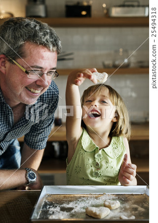 Family Father Girl Making Cookies Learning Baking Concept 25494318